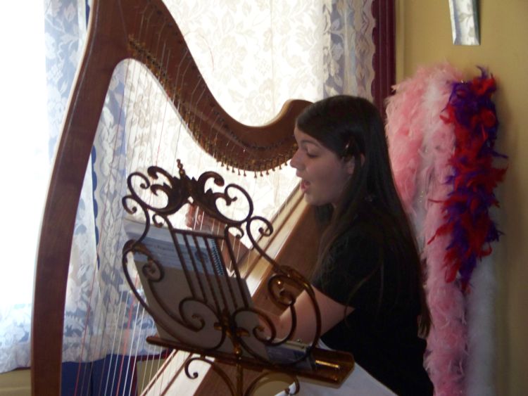 Brittany Gordon singing and accompanying herself on the harp at her National American Miss Sponsor Tea, October 2008